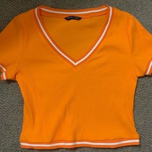 Orange crop top-fits more like a medium rather than a large